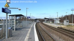 Bahnhof (nach Köln (ca. 20 Min)