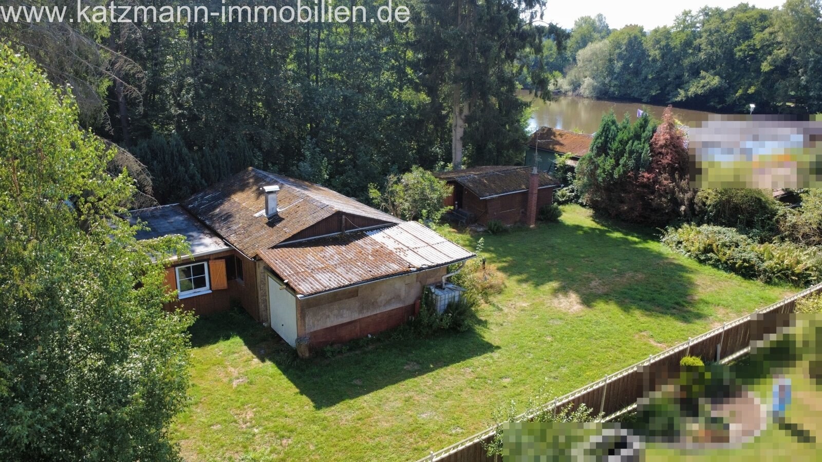 Haus mit See
